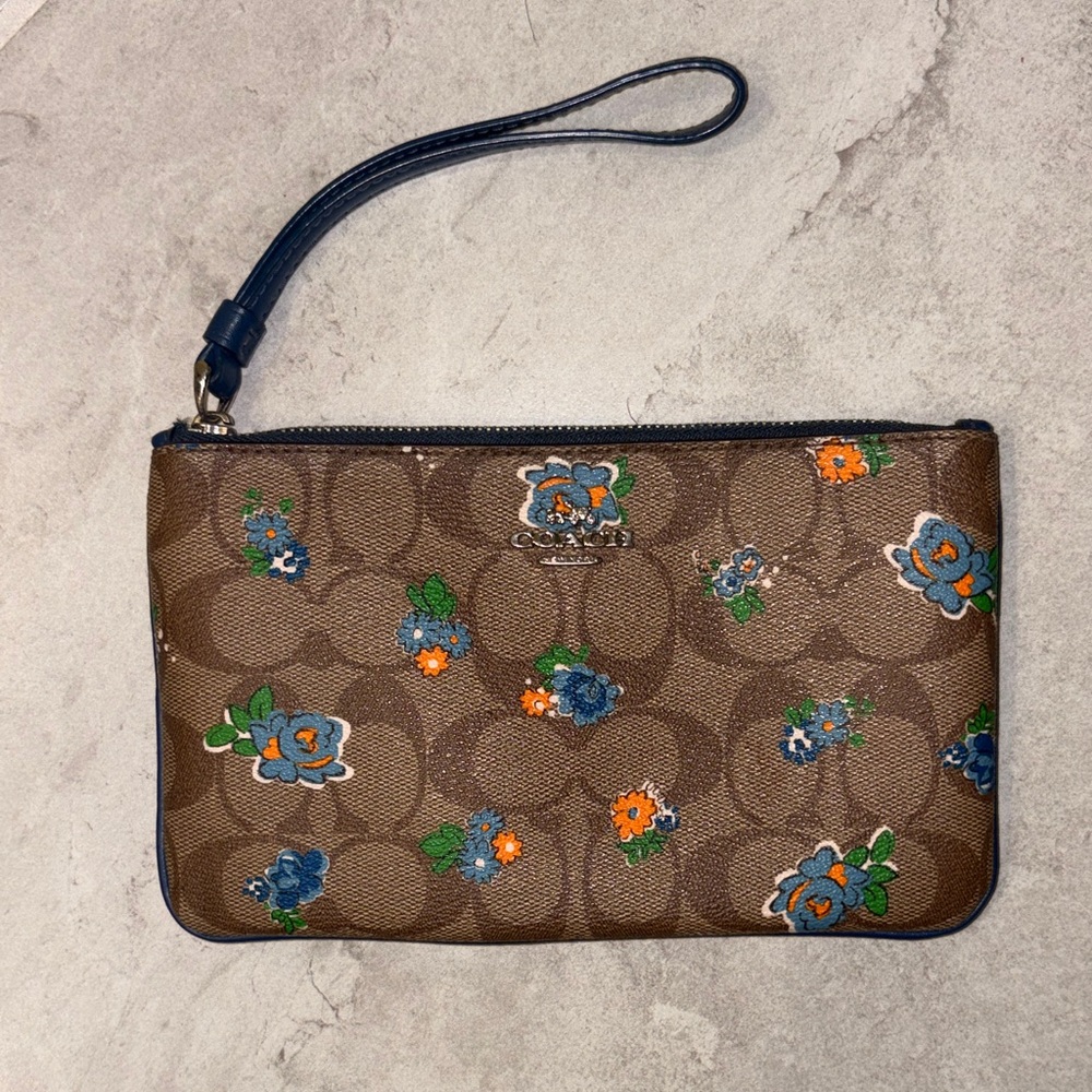 Coach Brown Wristlet with Blue and Orange Floral Design